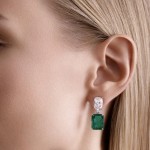 Earrings, 18-carat white gold with diamonds and emeralds
