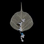 Kaff earring, 18-carat white gold with blue diamonds