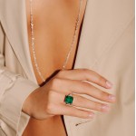 Ring, 18-carat white gold with diamonds and emeralds
