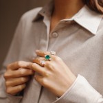 Ring, 18-carat white gold with diamonds and emeralds