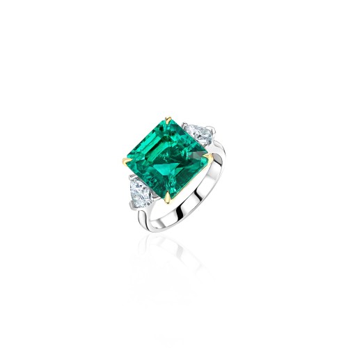 Ring 18-carat white gold with emeralds