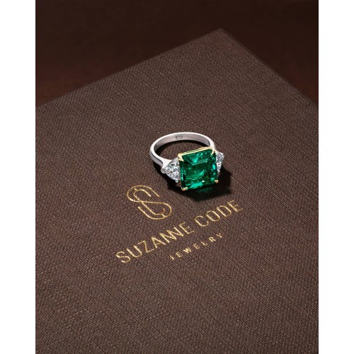 Ring 18-carat white gold with emeralds