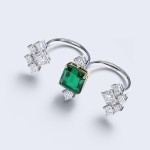 Ring, 18-carat white gold with diamonds and emeralds