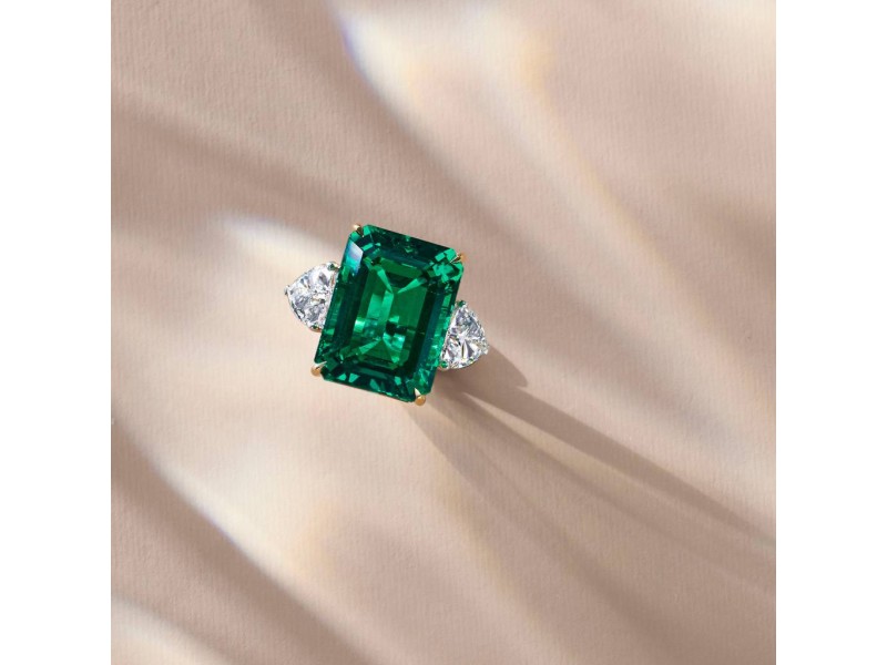 Ring, White gold/18k yellow gold with diamonds and emeralds