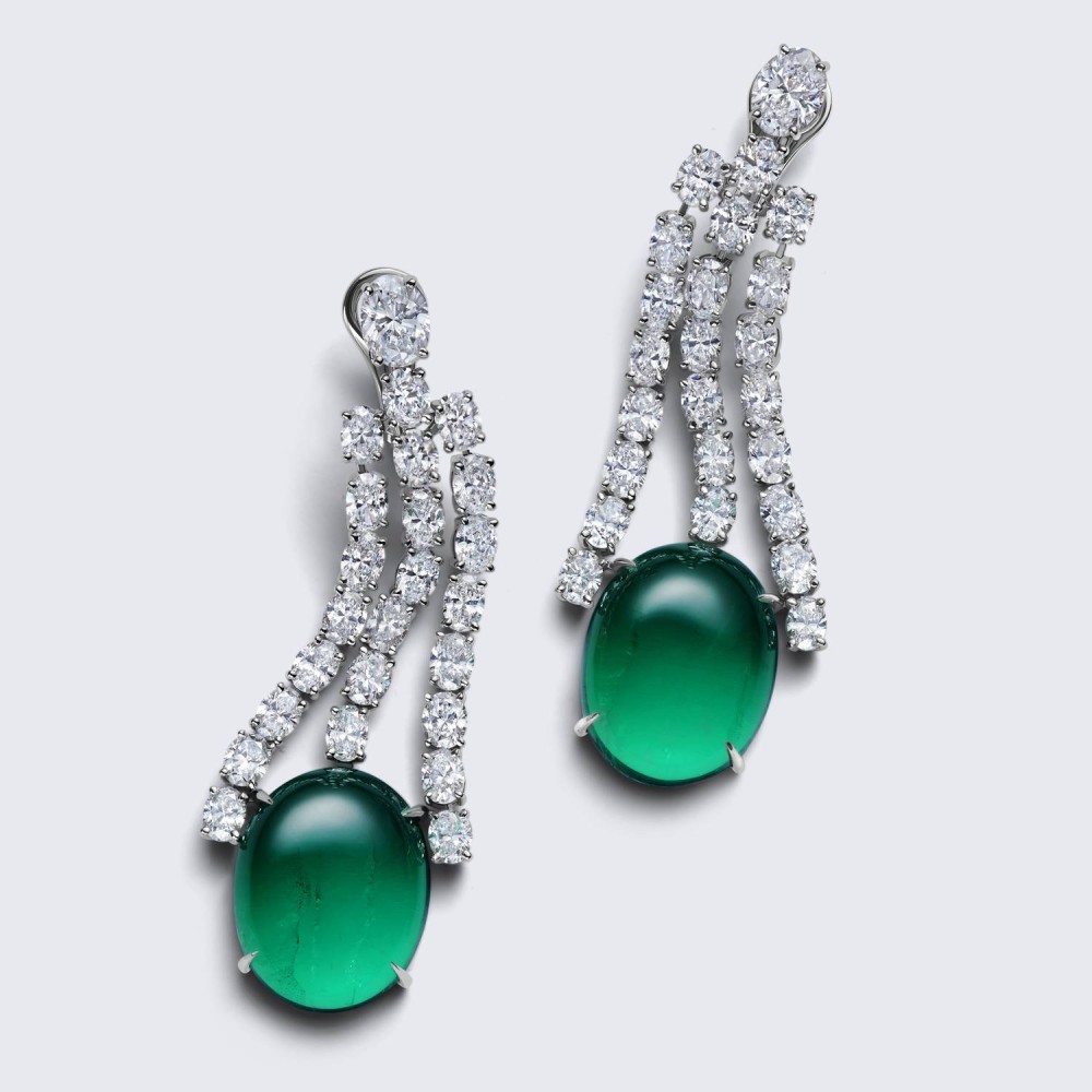 Earrings, 18-carat white gold with diamonds and emeralds