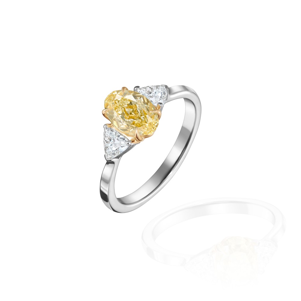 Ring, 18-carat white gold with diamonds and yellow diamonds